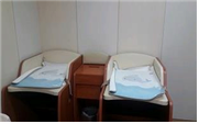 Infant nursing room 0 : Interior view of the nursing room located in the Hongdik Station near the Hongik University Tourist Information Center. It is large enough for two mothers to feed their babies at the same time