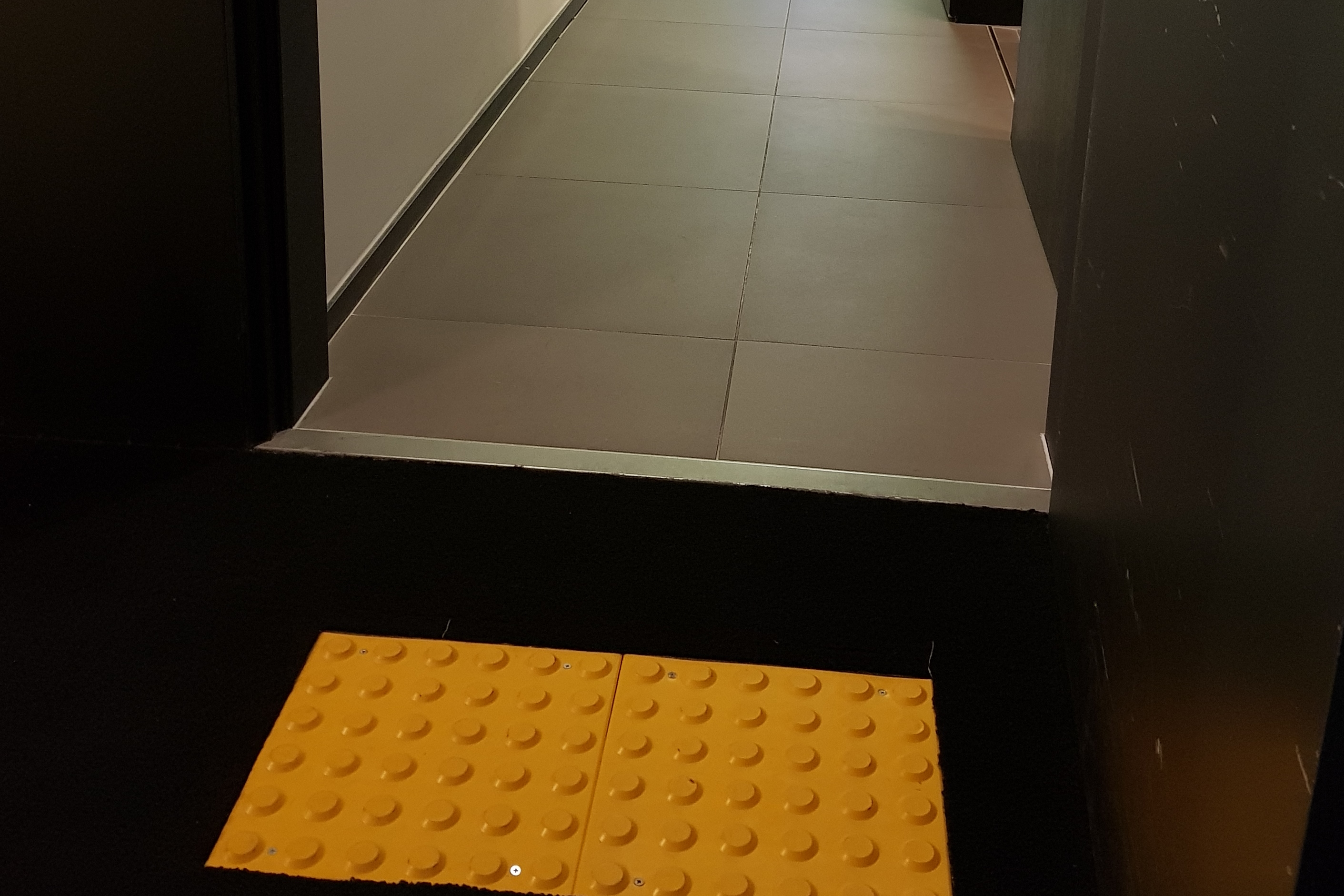Guestroom doorway0 : Room entrance of the Sotetsu Hotels The Splaisir Seoul Myeongdong with tactile flooring
