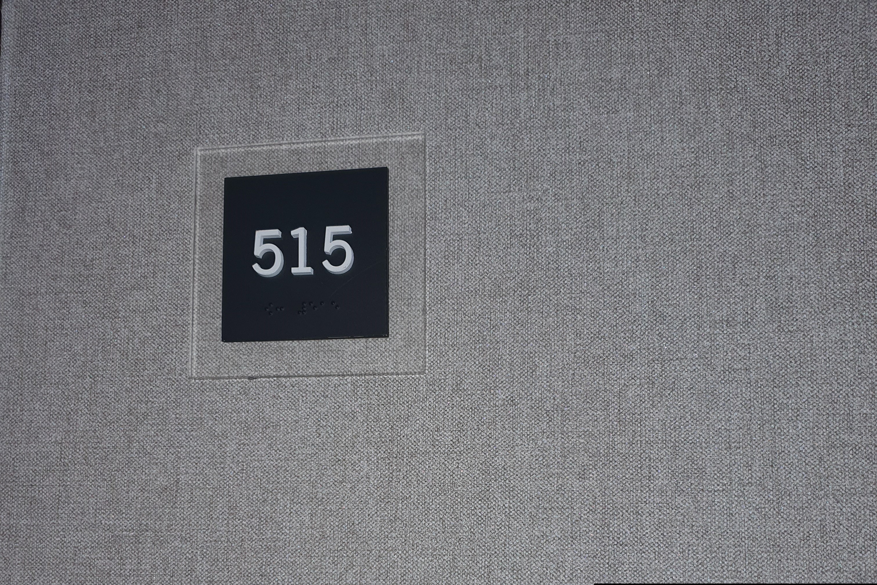 Accessible guestroom0 : Hotel door number plate with Korean braille